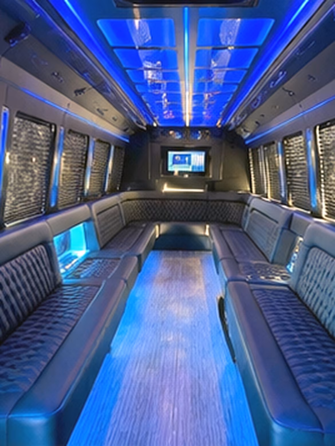 Wedding guests seated inside a party bus serving Salt Lake City